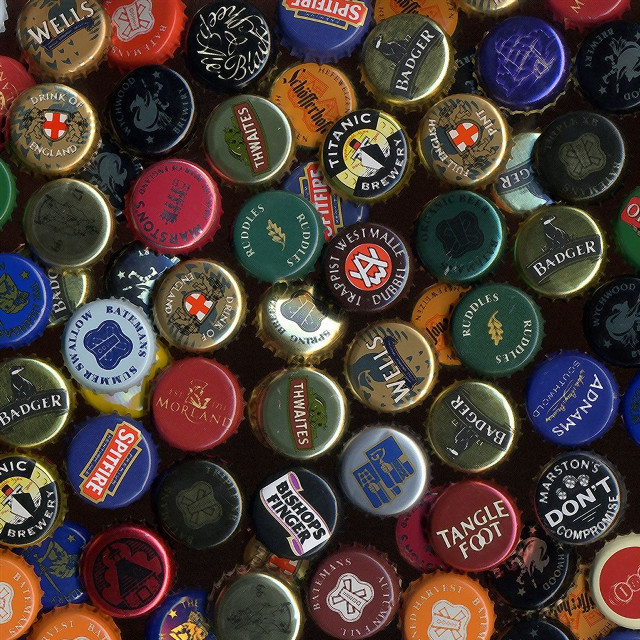 Colorful bottle caps black background free wallpaper for tablet - medium preview image
