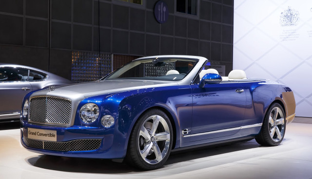 Blue car silver car showroom free wallpaper for desktop - medium preview image