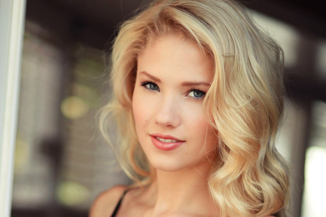 Blonde blue eyes woman camera free wallpaper for desktop - medium preview image