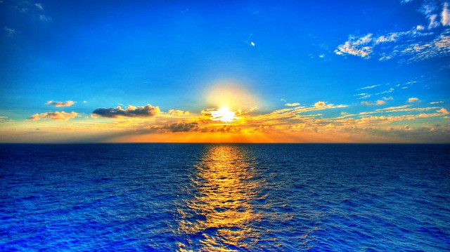 Sunset ocean clouds water blue free wallpaper for desktop - medium preview image