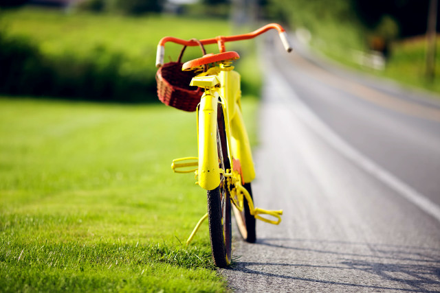 Yellow bike road grass street free wallpaper for desktop - medium preview image