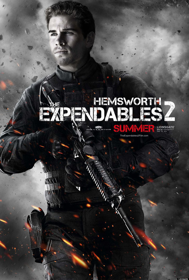 Man holding gun expendables2 poster free wallpaper for mobile - medium preview image