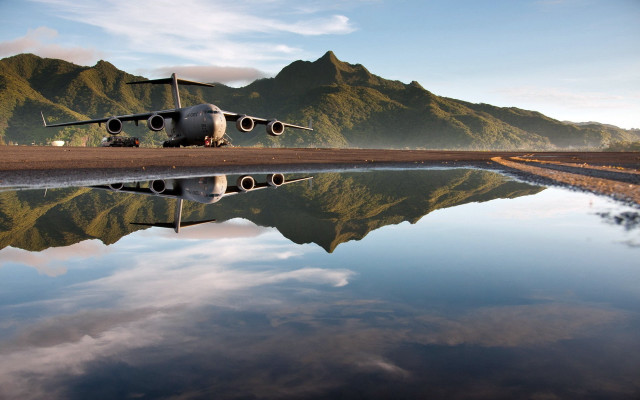 Plane tarmac mountain range water free wallpaper for desktop - medium preview image