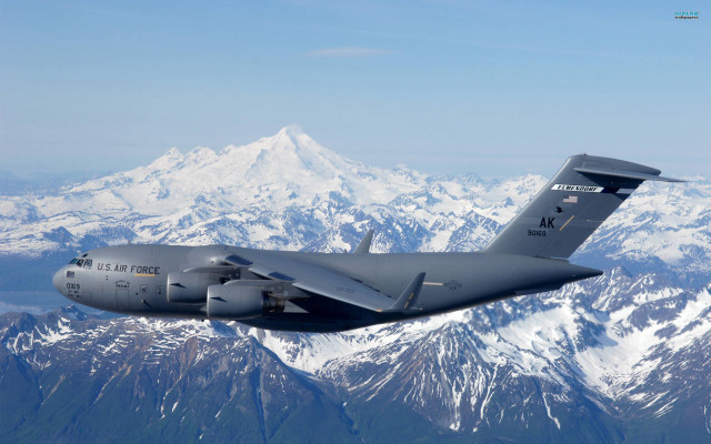 Military plane mountain range sky free wallpaper for desktop - medium preview image