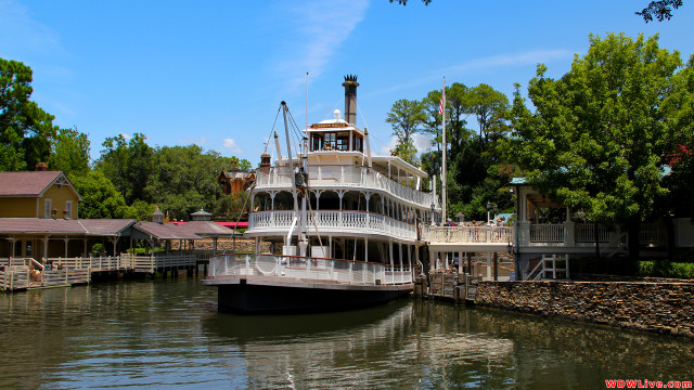 Large boat docked river houses free wallpaper for desktop - medium preview image