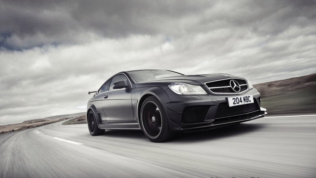 Mercedes c6 amg driving cloudy free wallpaper for desktop - medium preview image