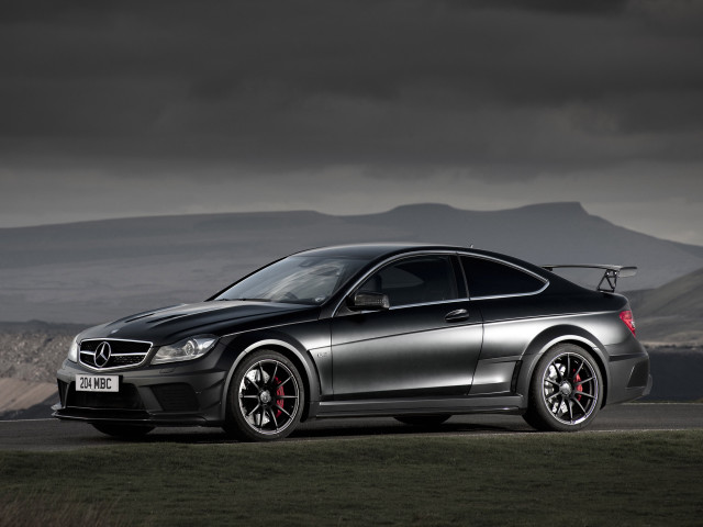 Silver car parked road mountains free wallpaper for desktop - medium preview image