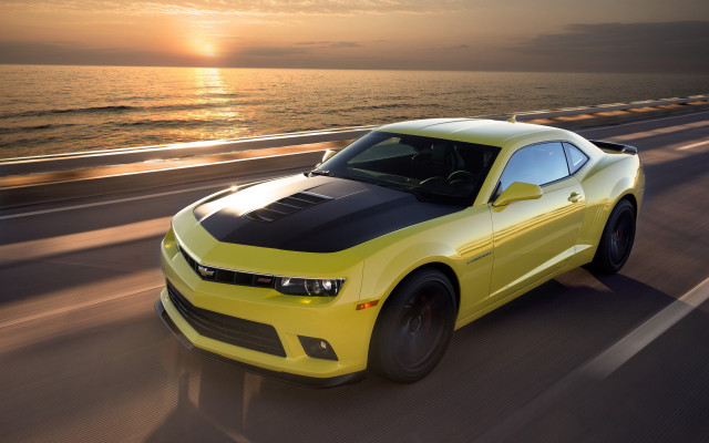 Yellow car ocean sunset driving free wallpaper for desktop - medium preview image