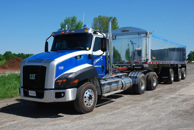 Large semi truck parked dirt free wallpaper for desktop - medium preview image