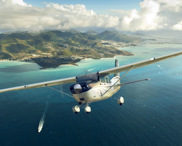 Small plane over water mountain free wallpaper for desktop - medium preview image
