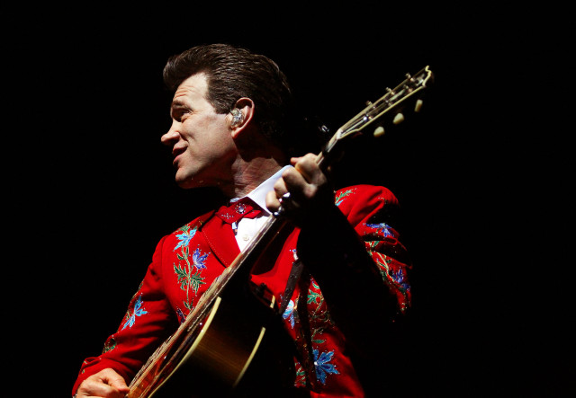 Man red shirt guitar microphone free wallpaper for desktop - medium preview image