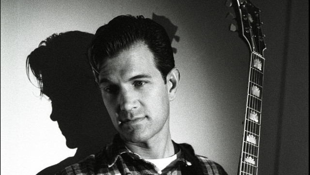 Man holding guitar shadow person free wallpaper for desktop - medium preview image