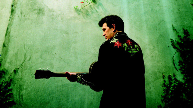 Man guitar green wall vines free wallpaper for desktop - medium preview image