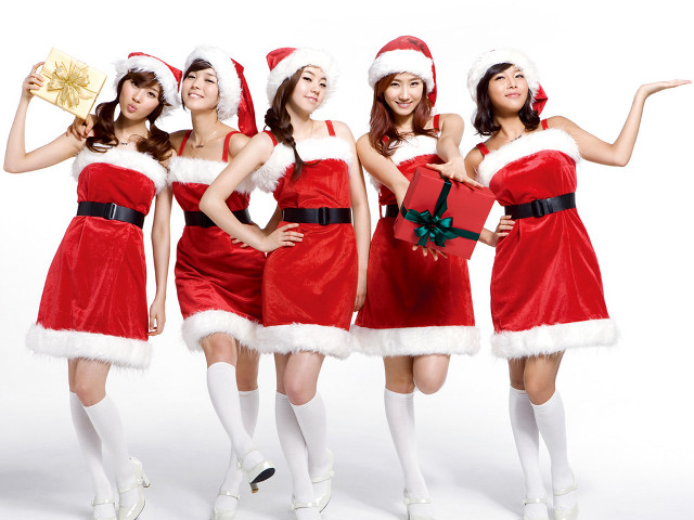 Santa costumes women holding presents free wallpaper for desktop - medium preview image