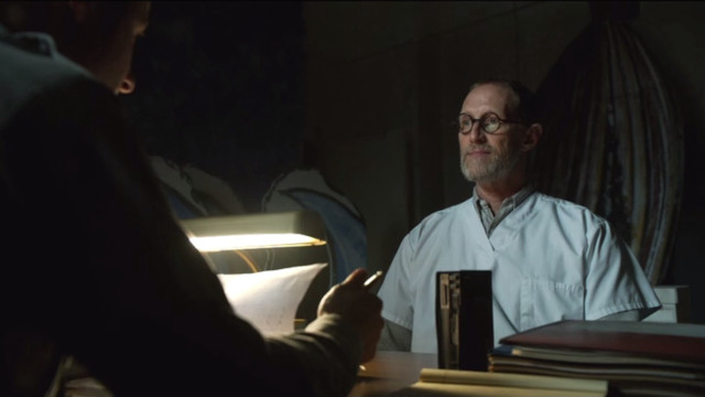 Man sitting desk book lamp free wallpaper for desktop - medium preview image