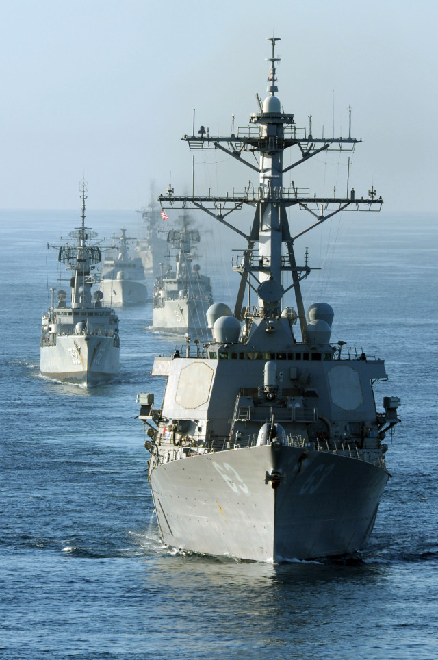 Fleet of ships sailing ocean free wallpaper for mobile - medium preview image