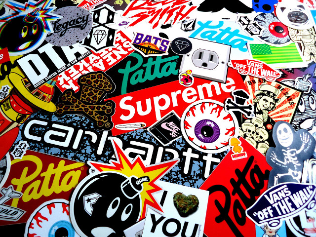 Stickers pile photograph shop chaos free wallpaper for desktop - medium preview image