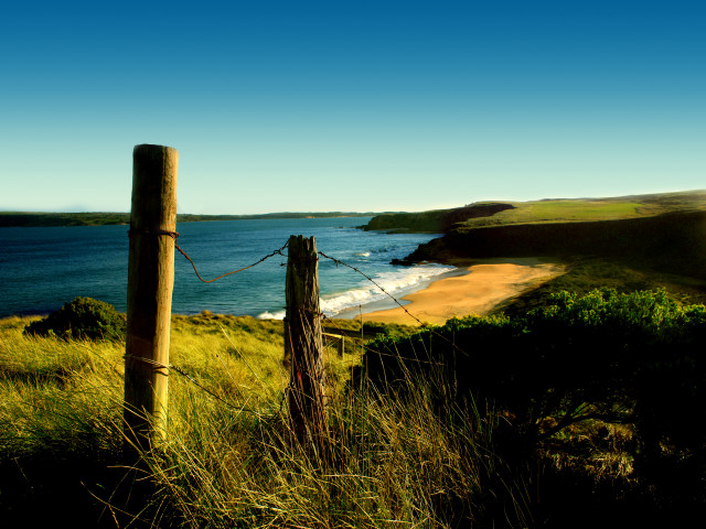 Wooden fence grassy hill ocean #2 free wallpaper for desktop - medium preview image