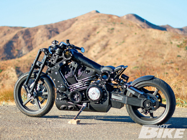 Black motorcycle parked road mountain free wallpaper for desktop - medium preview image