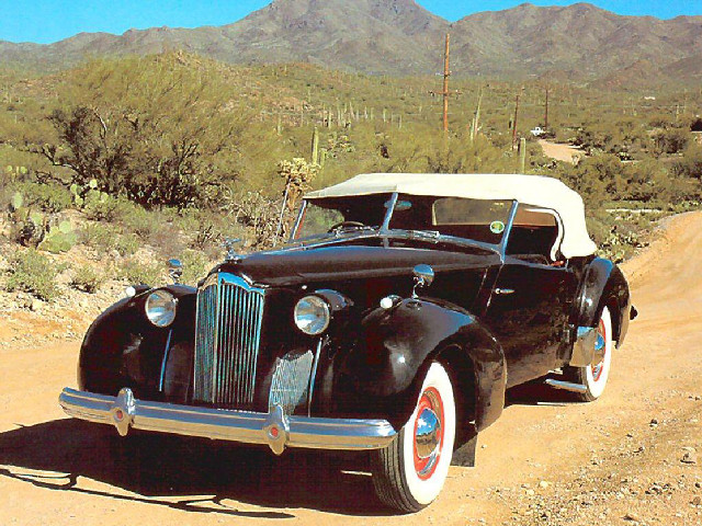 Old black car dirt road free wallpaper for desktop - medium preview image