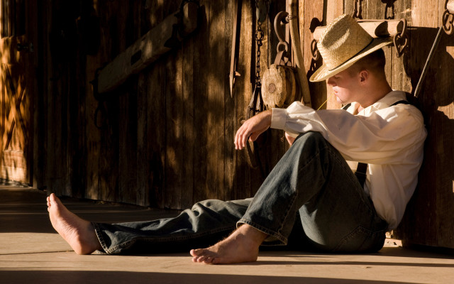 Man sitting straw hat jeans free wallpaper for desktop - medium preview image