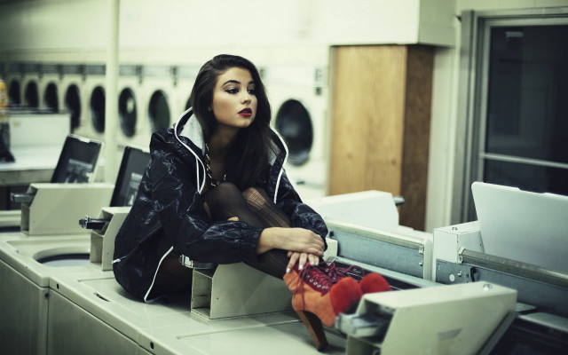 Woman laundry machine laptop stack free wallpaper for desktop - medium preview image