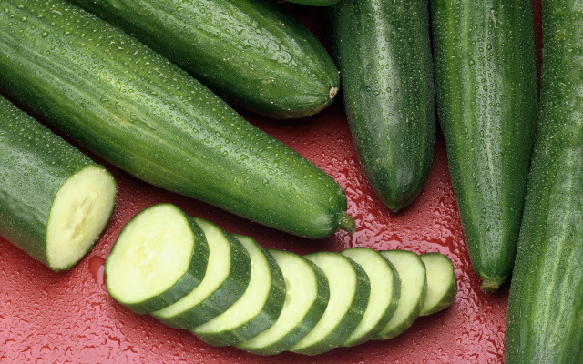 Cucumbers red surface slices cut free wallpaper for desktop - medium preview image