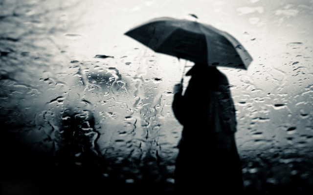 Person standing rain umbrella black free wallpaper for desktop - medium preview image