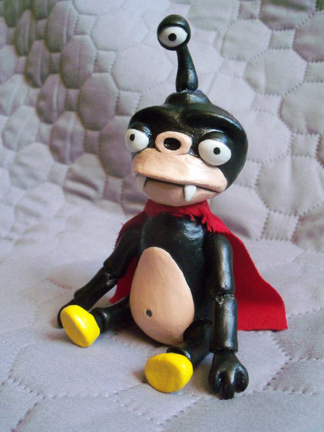 Toy figure cartoon character bed free wallpaper for mobile - medium preview image