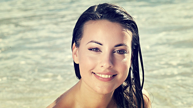 Woman long hair standing water free wallpaper for desktop - medium preview image