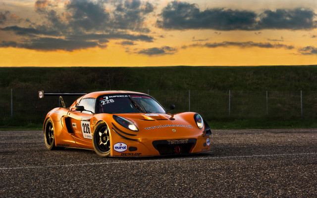 Sports car sunset road clouds free wallpaper for desktop - medium preview image