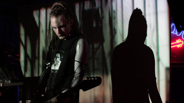 Long haired guitarist neon dark free wallpaper for desktop - medium preview image