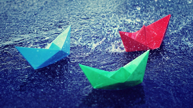 Origami boats sitting ground rain free wallpaper for desktop - medium preview image