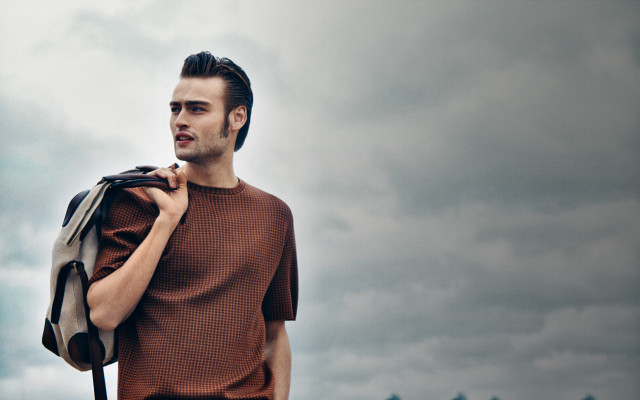 Man backpack cloudy sky building free wallpaper for desktop - medium preview image