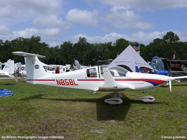 Small plane parked grass other free wallpaper for desktop - medium preview image