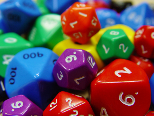 Colorful dice pile tabletop white free wallpaper for desktop - medium preview image