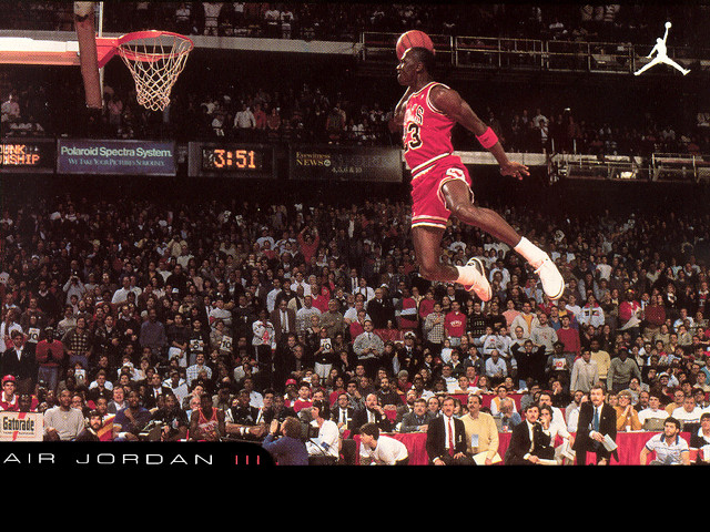 Man red uniform jumping basketball #4 free wallpaper for desktop - medium preview image