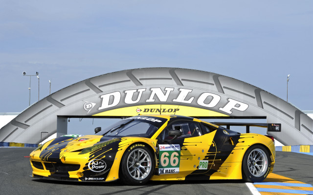 Yellow race car tunnel tires free wallpaper for desktop - medium preview image