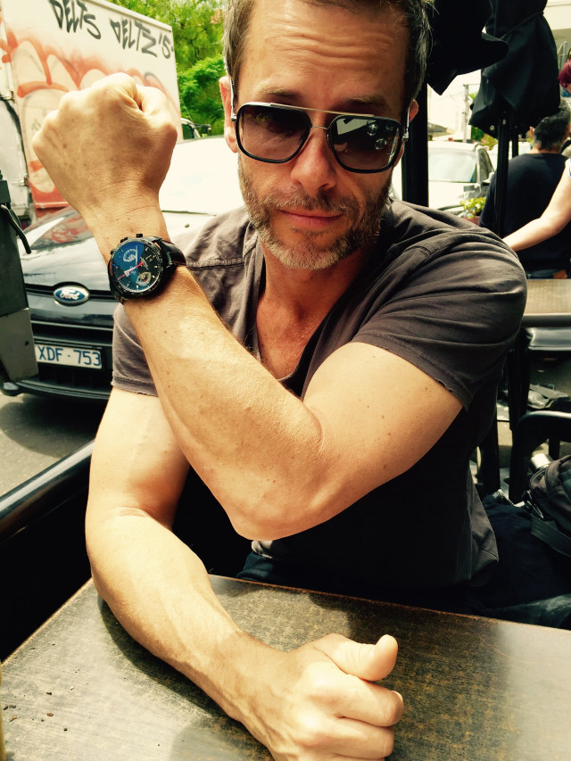 Man watch restaurant table graffiti free wallpaper for mobile - medium preview image