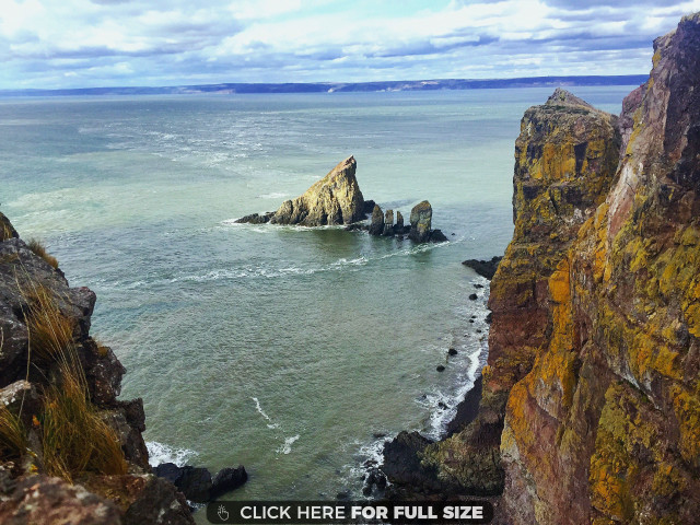Rocky cliff ocean rock formation free wallpaper for desktop - medium preview image
