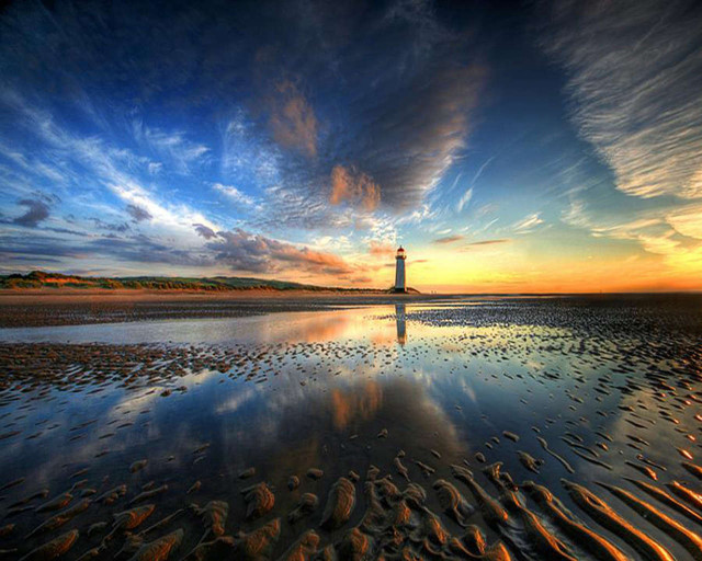 Lighthouse beach sunset clouds water #2 free wallpaper for desktop - medium preview image