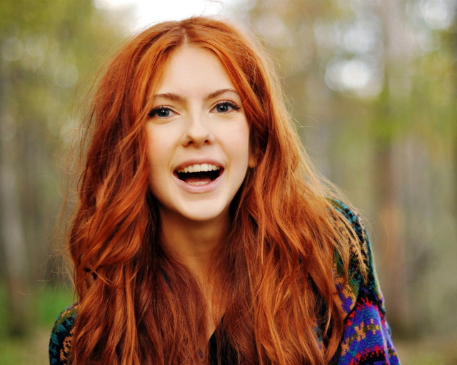 Woman red hair smiling cell free wallpaper for desktop - medium preview image