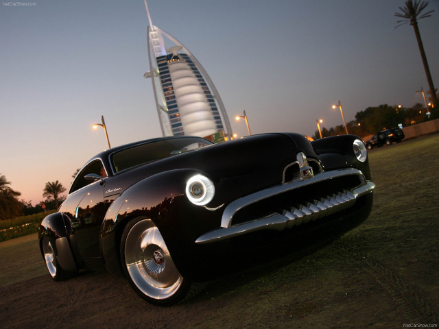 Black car tall building night free wallpaper for desktop - medium preview image