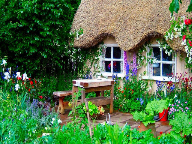 Enchanted garden thatched roof table free wallpaper for desktop - medium preview image