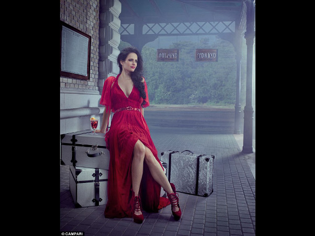 Woman red dress sitting suitcase free wallpaper for desktop - medium preview image