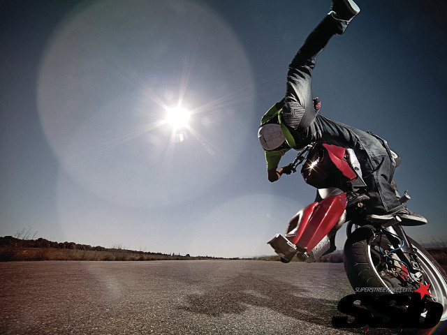Motorcycle trick person hands air free wallpaper for desktop - medium preview image