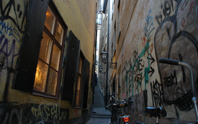 Narrow alley graffiti bicycle parked free wallpaper for desktop - medium preview image