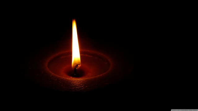 Lit candle dark black background free wallpaper for desktop - medium preview image