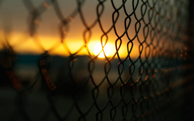 Sunset chain link fence building free wallpaper for desktop - medium preview image