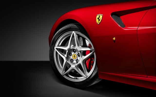 Red sports car ferrari logo #2 free wallpaper for desktop - medium preview image